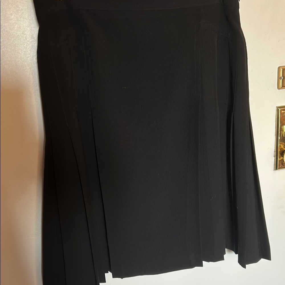 Paniz Black A-line Pleated Mini Skirt. Fine wool